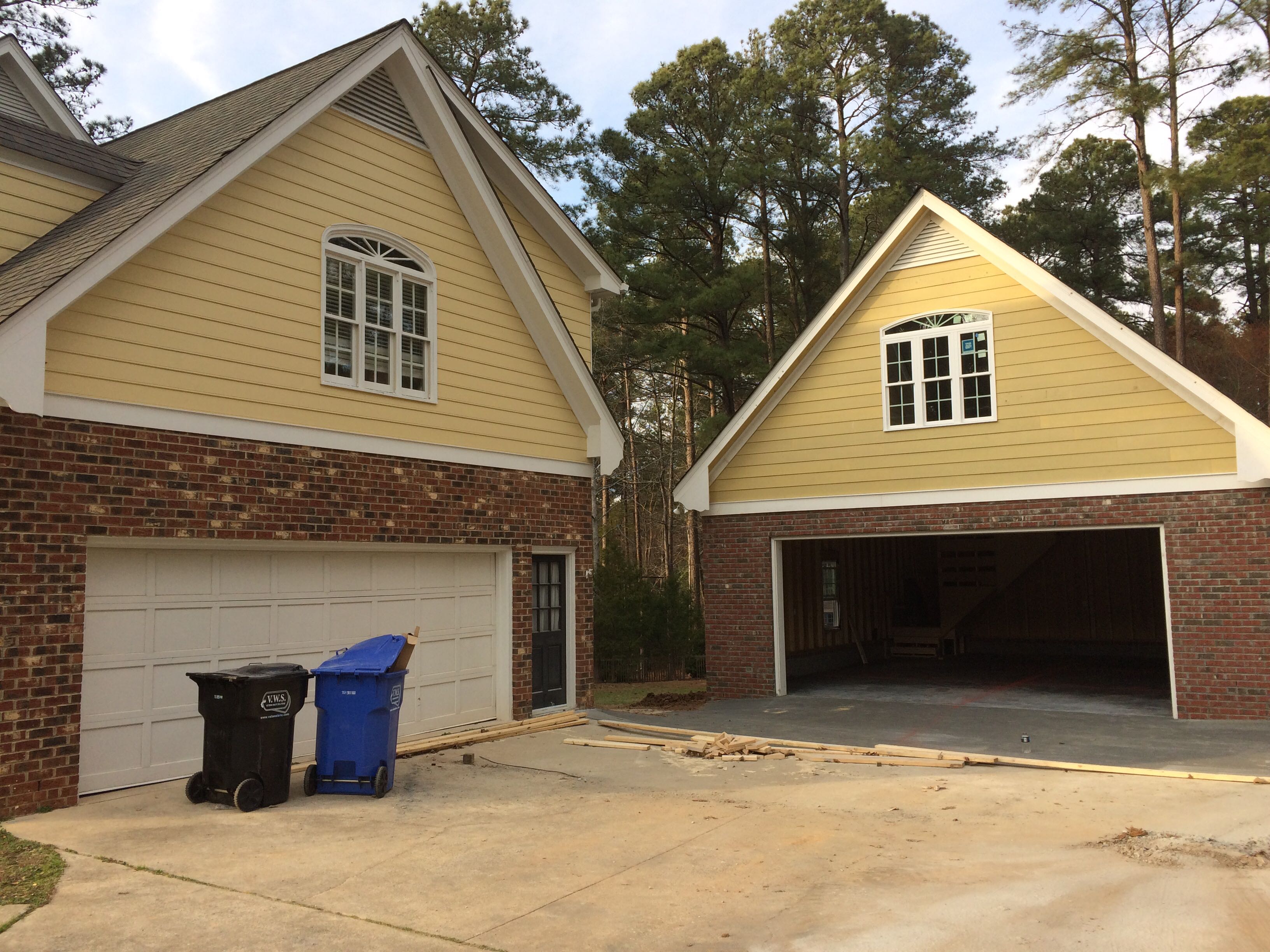 prefab garage vs. stick built garage